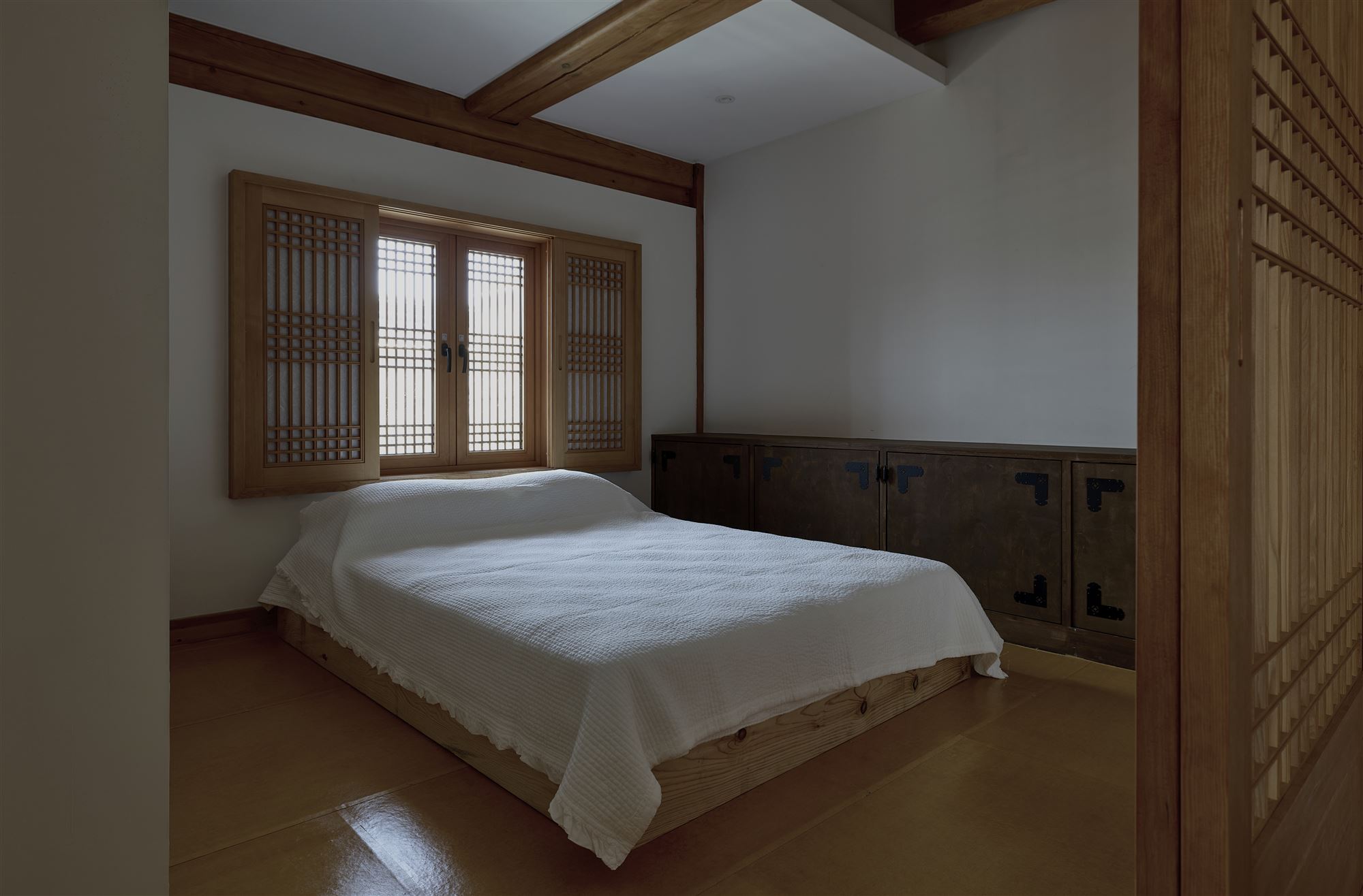 The second bedroom, where paper windows and antique furniture meet